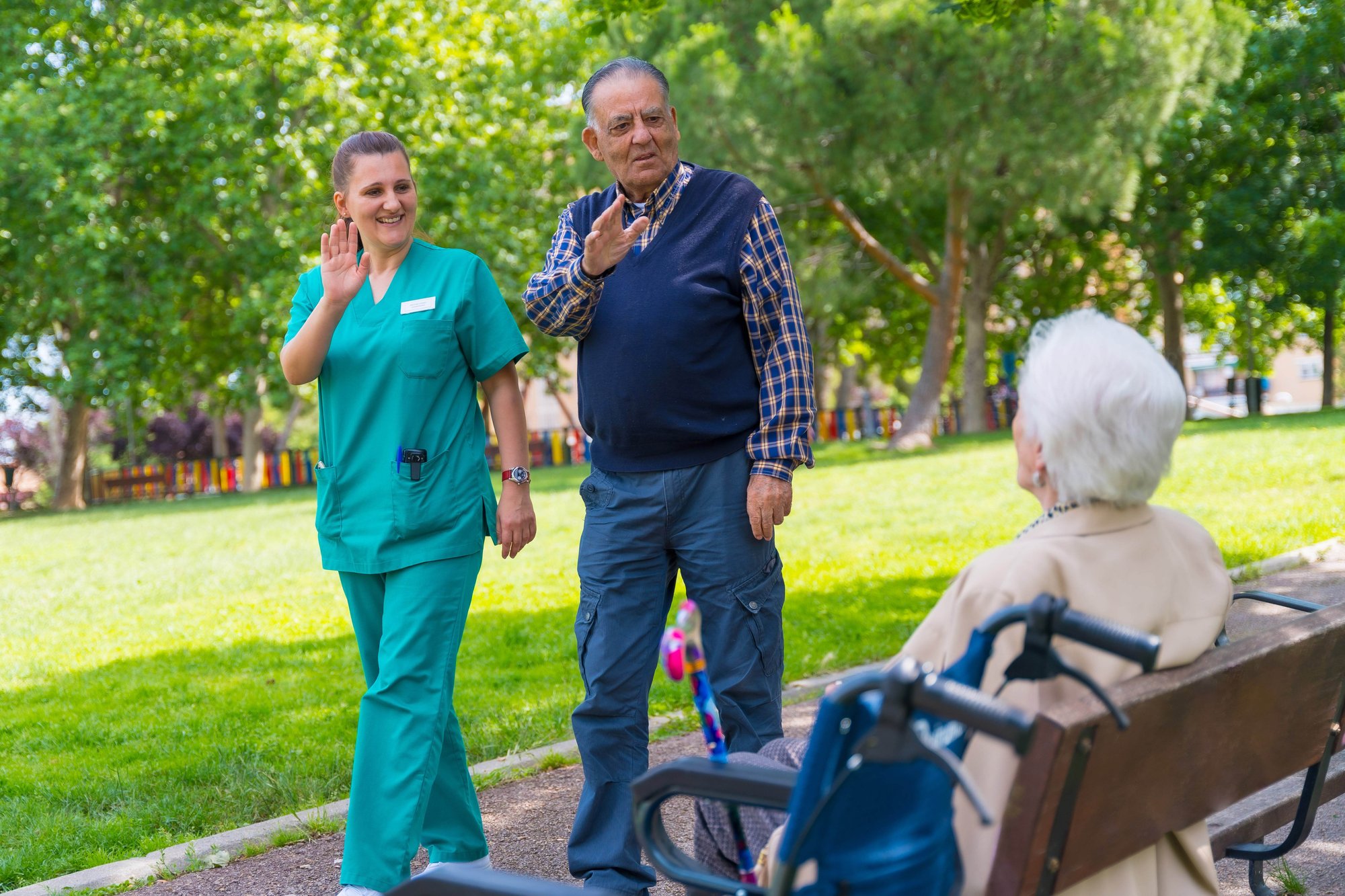 an-elderly-man-with-the-nurse-on-a-walk-through-th-2023-11-27-05-28-45-utc-Web